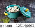 Meat dumplings - russian pelmeni in a bowl on a dark background 123140603