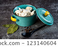 Meat dumplings - russian pelmeni in a bowl on a dark background 123140604