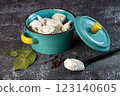 Meat dumplings - russian pelmeni in a bowl on a dark background 123140605