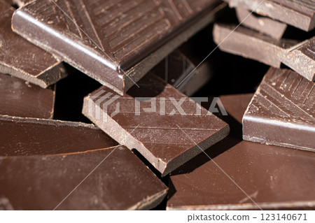 Delicious dark chocolate segments, rich black chocolate texture 123140671