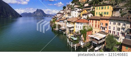most beautiful traditional villages of Switzerland - scenic Gandria with colorful houses in lake Lugano, canton Ticino . Border with Italy. Aerial drone panoramic view 123140881