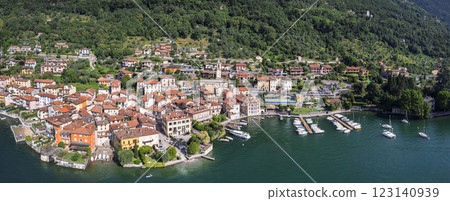 Scenic and famous italian lake Lago di Como. Most beautiful places. aerial panoramic view of beautiful village Sala Comacina. Italy, Lombardia Scenic and famous italian lake Lago di Como. Most beautiful places. aerial panoramic view of beautiful village Sala Comacina. Italy, Lombardia 123140939