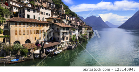 most beautiful traditional villages of Switzerland - scenic Gandria with colorful houses in lake Lugano, canton Ticino . Border with Italy.  123140945