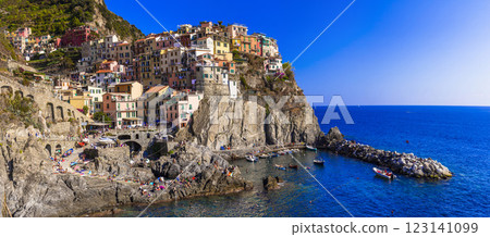 Italy, Cinque terre famous national park of traditional fishing villages. Manarola  colorful houses and picturesque bay. popular tourist attraction in Liguria 123141099