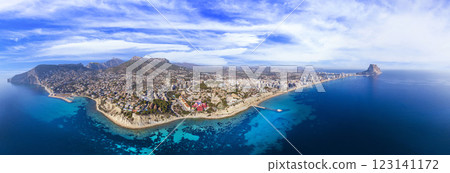 Costa Blanca, Spain. Scenic Calpe city of Aerial drone panoramic high angle view, coastal cityscape panorama. Spanish summer destination Costa Blanca, Spain. Scenic Calpe city of Aerial drone panoramic high angle view, coastal cityscape panorama. Spanish summer destination 123141172