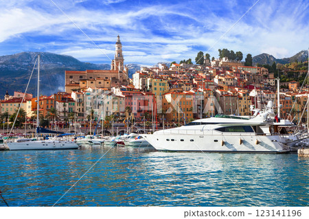 Mentone - beautiful coastal town resort in French riviera. view of marine with sail boats,yachts  and colorful houses. Cote d'azure, Alpes-maritimes, France 123141196