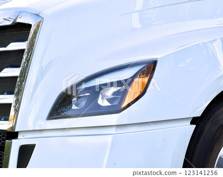 Close up of white truck headlight 123141256