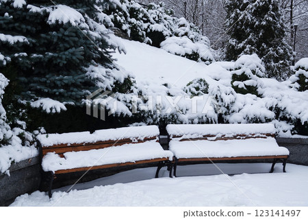 shops in the snow in the winter in the park in the afternoon 123141497