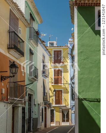Narrow street with colorful houses in Villajoyosa, Spain 123141647