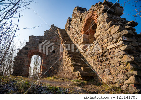 Old fortress ruins near chapel in a small czech town Petrohrad. Way of pilgrims, Czech republic. 123141705