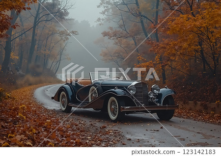 Elegant Vintage Car On Country Road Surrounded By Fall Foliage And Misty Atmosphere 123142183
