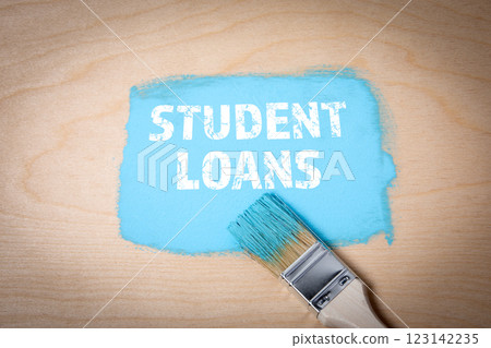 Student Loans. Blue paint and paintbrush on wooden background 123142235