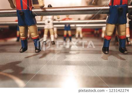 Foosball Table with Colorful Players in Action 123142274