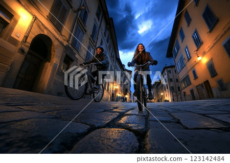 a portrait of a smiling girl and a man ride bicycles through the city a portrait of a smiling girl and a man ride bicycles through the city 123142484