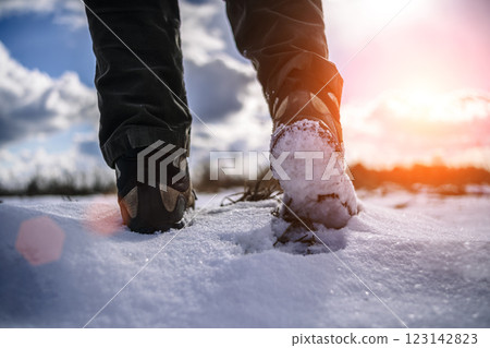 Hiker goes against sky and sun. Hiking concept  123142823