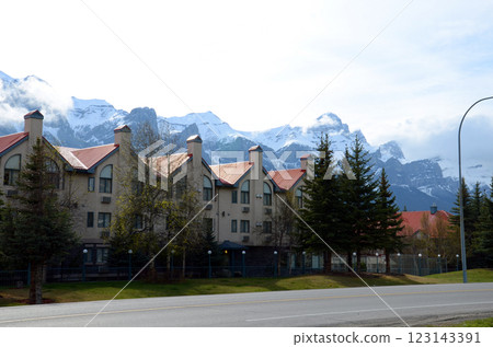 Residences alongside snowed mountains Residences alongside snowed mountains 123143391