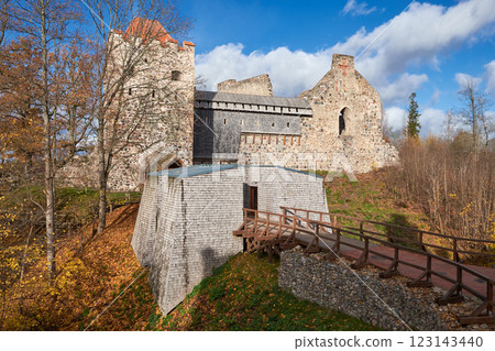 View of old Medieval Castle in Sigulda, Latvia, with Autumn Scenery 123143440