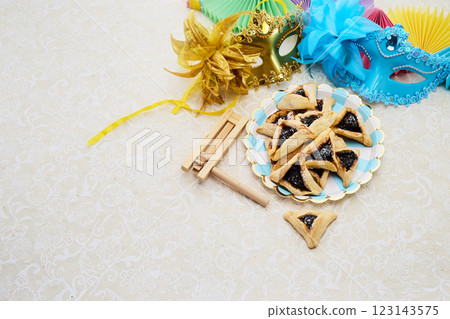 Purim Festive Setup. Colorful Purim scene with masks, 123143575