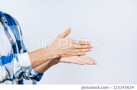 Hands gesturing STOP in sign language. Close up of hands gesturing STOP in sign language Hands gesturing STOP in sign language. Close up of hands gesturing STOP in sign language 123143624