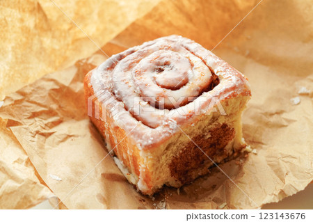 Baked breakfast treats at a bakery, cinnamon rolls, copy space Baked breakfast treats at a bakery, cinnamon rolls, copy space 123143676