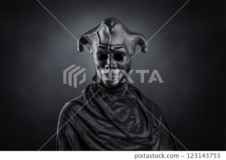 Portrait of a scary medieval clown over dark misty background with clipping path Portrait of a scary medieval clown over dark misty background with clipping path 123143755