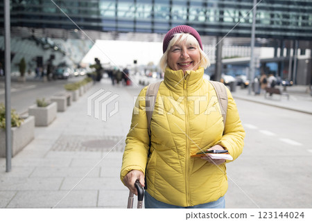 International airport terminal. Asian beautiful woman with luggage and walking in airport International airport terminal. Asian beautiful woman with luggage and walking in airport 123144024
