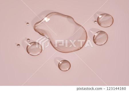 The texture of micellar water on a pink background. 123144160
