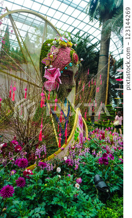 Singapore's iconic flower dome garden, which is beautifully designed buildings. Cloud forest dome, Garden by the Bay. 123144269