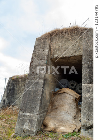 View of the remains of the air raid shelter on the north side of the former Yanagimoto Airfield 123144795