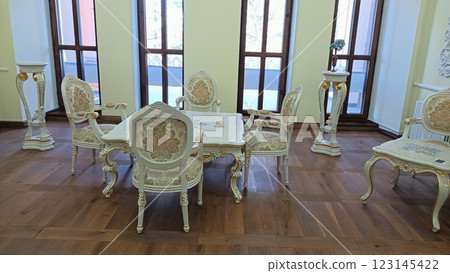 An Elegant Vintage Dining Room Furniture Set Featuring Beautifully Decorative Chairs An Elegant Vintage Dining Room Furniture Set Featuring Beautifully Decorative Chairs 123145422