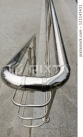 A contemporary and modern stainless steel handrail design prioritizing safety and elegance A contemporary and modern stainless steel handrail design prioritizing safety and elegance 123145431