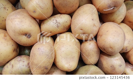 Fresh Potatoes That Are Piled Together in a Wonderful Bounty of Harvest and Nature 123145436
