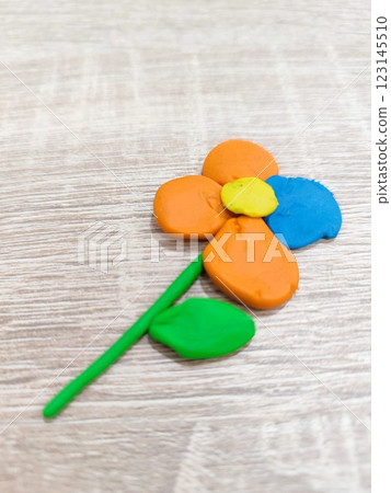 A Colorful Handmade Flower Craft Representation That Showcases Vibrant Artistry and Creativity 123145510