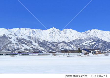 Oito Line Limited Express Azusa going to the foot of Mt. Hakuba in winter 123146741