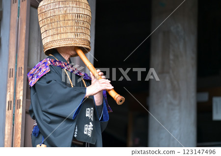 Komuso performing at the main hall of Masuiyama Zuiganji Temple 123147496