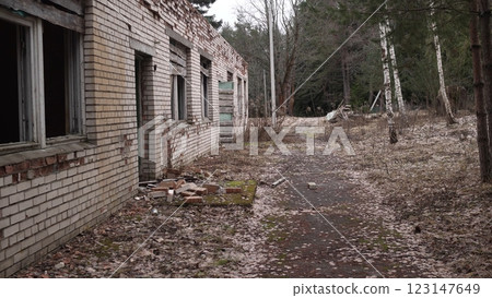 Abandoned brick buildings in the radioactive zone 123147649