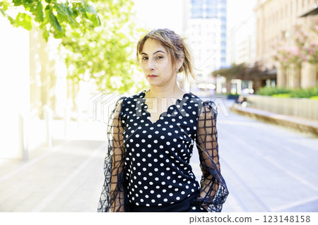 Indian woman with serious face, office casual Indian woman with serious face, office casual 123148158