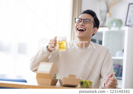 Male drinking beer 123148382