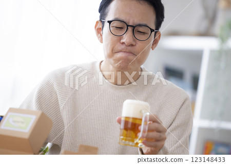 Male drinking beer Male drinking beer 123148433