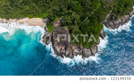 Panoramic view showcasing lush green coastline with turquoise waters stretching into the horizon. Seychelles, Mahe. Panoramic view showcasing lush green coastline with turquoise waters stretching into the horizon. Seychelles, Mahe. 123149330