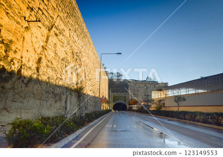 Illuminated Tunnel Entrance on Scenic Road in Malta 123149553