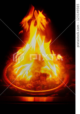 Cozy Fire Pit Glowing Flames Charcoal Heat Warm Relaxing Ambiance Cozy Fire Pit Glowing Flames Charcoal Heat Warm Relaxing Ambiance 123149565