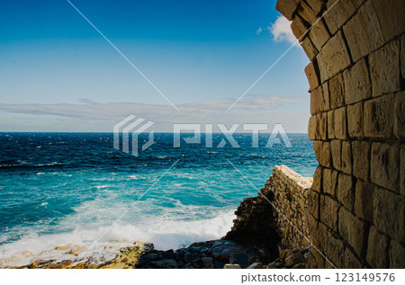 Ancient Stone Archway Overlooking the Blue Ocean Coastal Landscape,Coastal Landscape Ancient Stone Archway Overlooking the Blue Ocean Coastal Landscape,Coastal Landscape 123149576