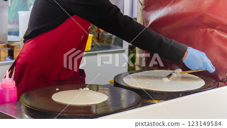 Street Food Pancake Love Irresistible Crepes Cooking on the Spot Street Food Pancake Love Irresistible Crepes Cooking on the Spot 123149584