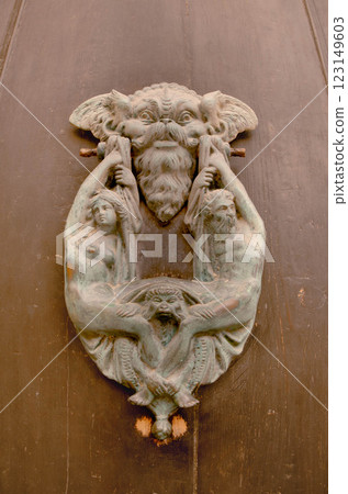 Antique Bronze Door Knocker Mythological Artistic Design Antique Bronze Door Knocker Mythological Artistic Design 123149603