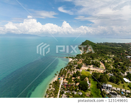 Island landscape featuring tropical vegetation, sandy beaches, and calm turquoise waters under a sunny sky. Koh Samui, Thailand. 123149691