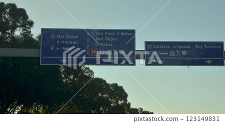 Malta Road Signage at Sunset Directions to Major Cities Malta Road Signage at Sunset Directions to Major Cities 123149831