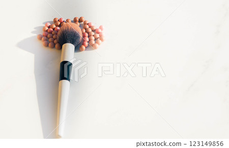 Make up Blush Brush with Loose Powder Beads on Minimalist White Background, copy space , banner Make up Blush Brush with Loose Powder Beads on Minimalist White Background, copy space , banner 123149856