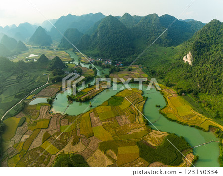 Aerial wide angle view of landscape with rice field at Phong Nam village in Trung Khanh, Cao Bang province,Northern Vietnam Aerial wide angle view of landscape with rice field at Phong Nam village in Trung Khanh, Cao Bang province,Northern Vietnam 123150334