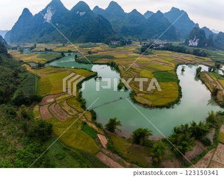 Aerial wide angle view of landscape with rice field at Phong Nam village in Trung Khanh, Cao Bang province,Northern Vietnam Aerial wide angle view of landscape with rice field at Phong Nam village in Trung Khanh, Cao Bang province,Northern Vietnam 123150341